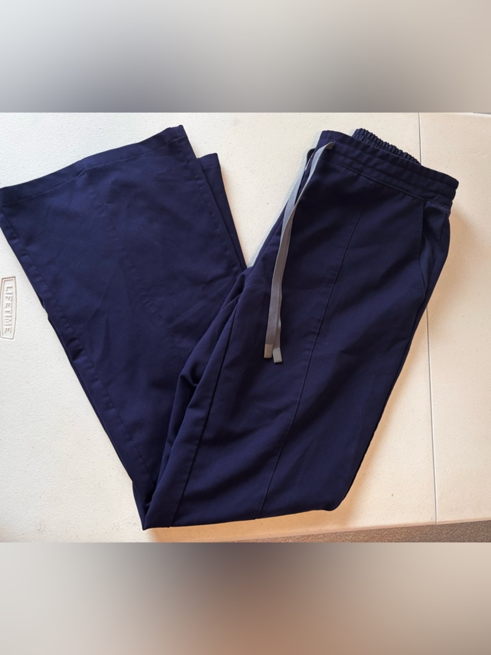 FIGS Navy Flare Scrub bottom